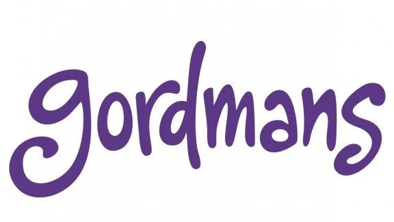 Purple Gordmans logo on white background