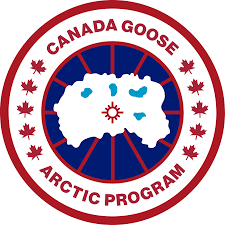 Circular red, white, and blue emblem reading “CANADA GOOSE ARCTIC PROGRAM,” featuring a stylized Arctic map in the center surrounded by red maple leaves.